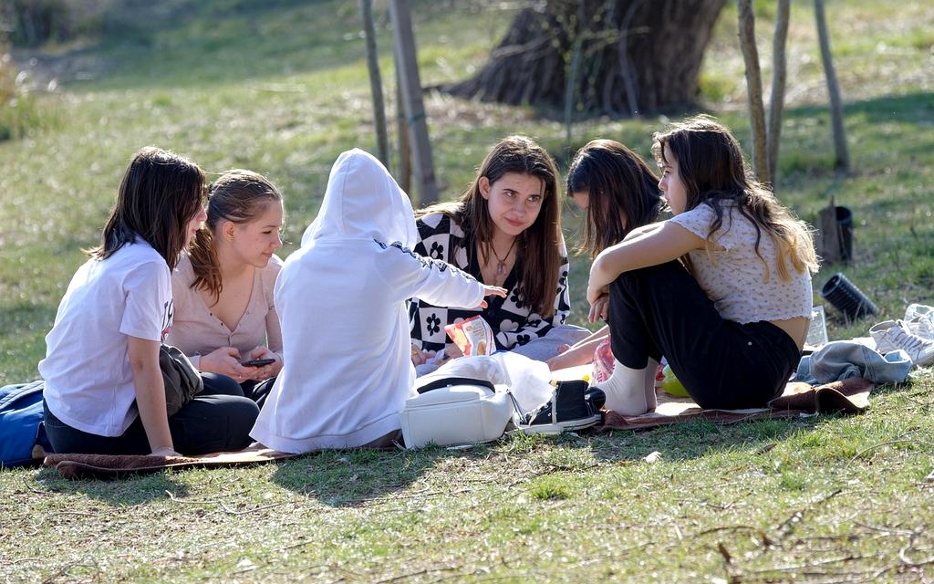 Community members learning together outdoors